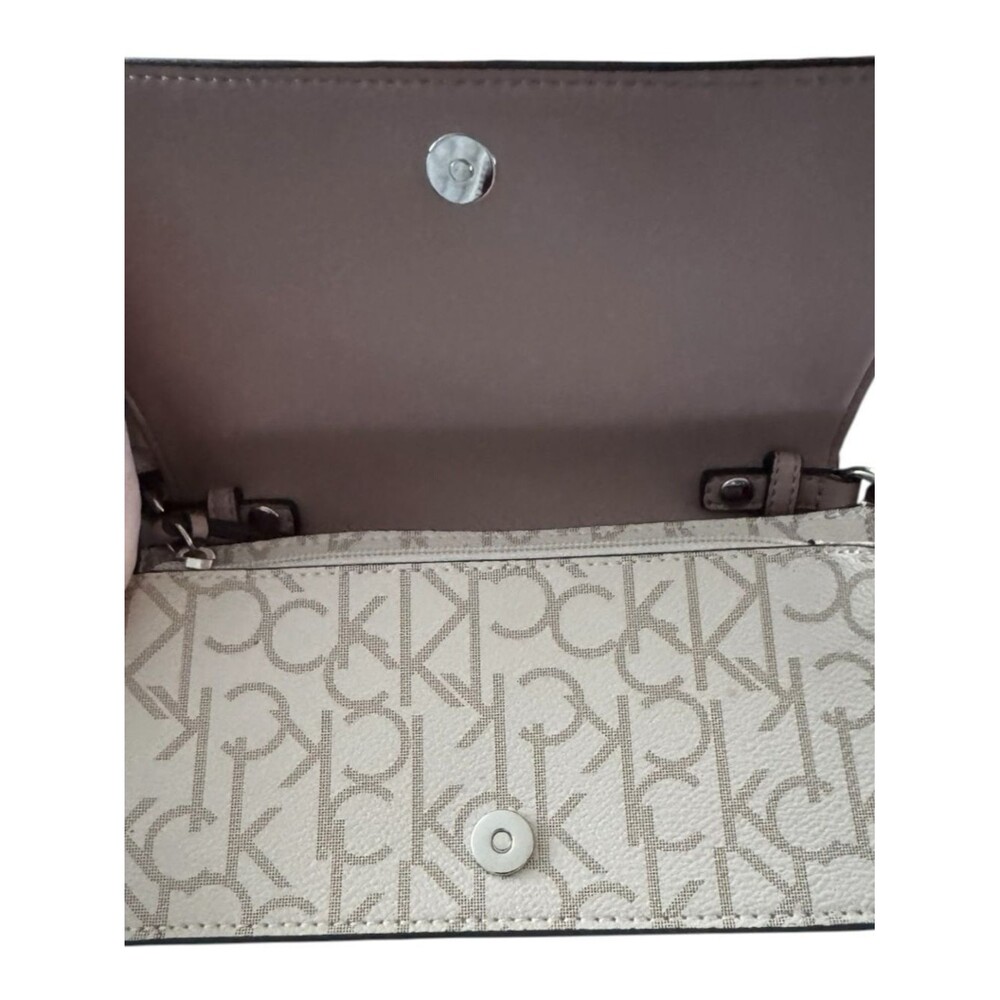 Calvin Klein crossbody bag, specifically identified as a Charlie Flap Crossbody - Picture 2 of 5
